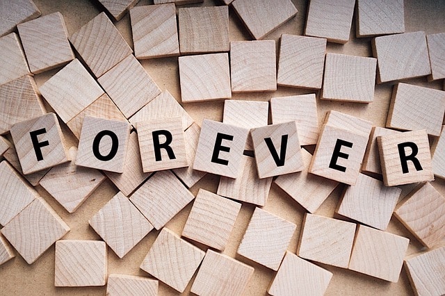 Scrabble squares spelling out the word Forever